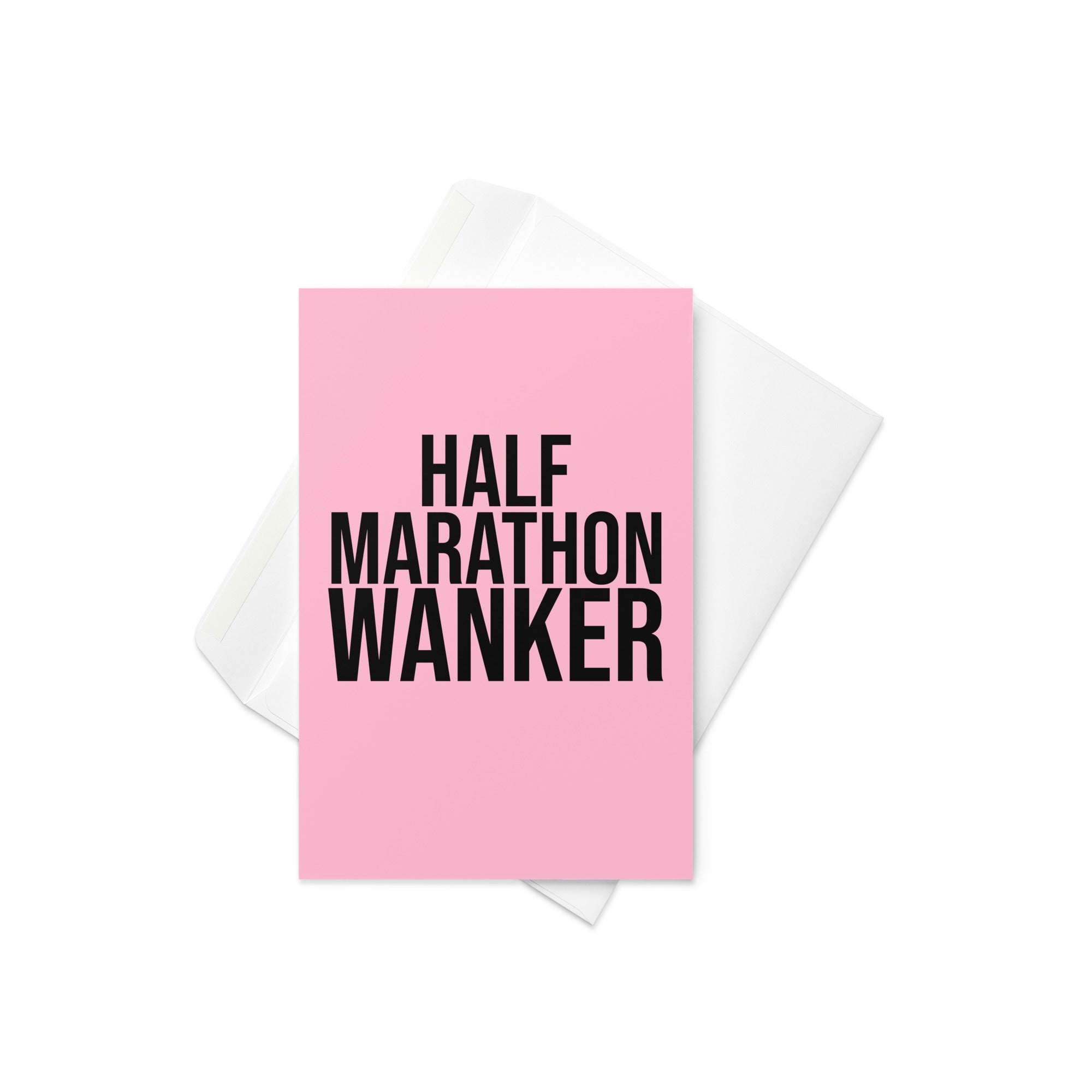 pink greetings card with bold black font reading half marathon wanker. a gift card for someone who has trained for and completed a half marathon race 