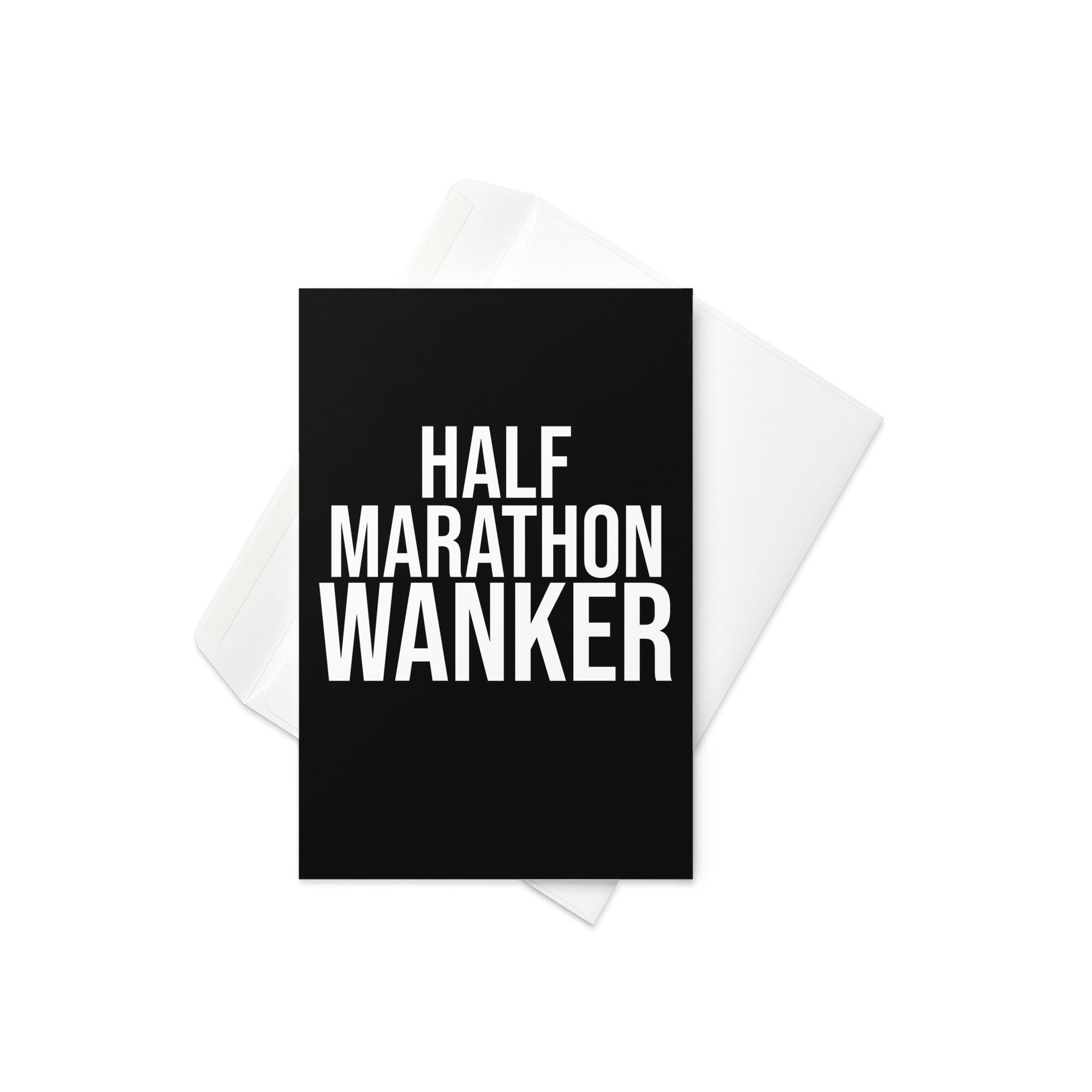 black greetings card with bold white font reading half marathon wanker. a gift card for someone who has trained for and completed a half marathon race