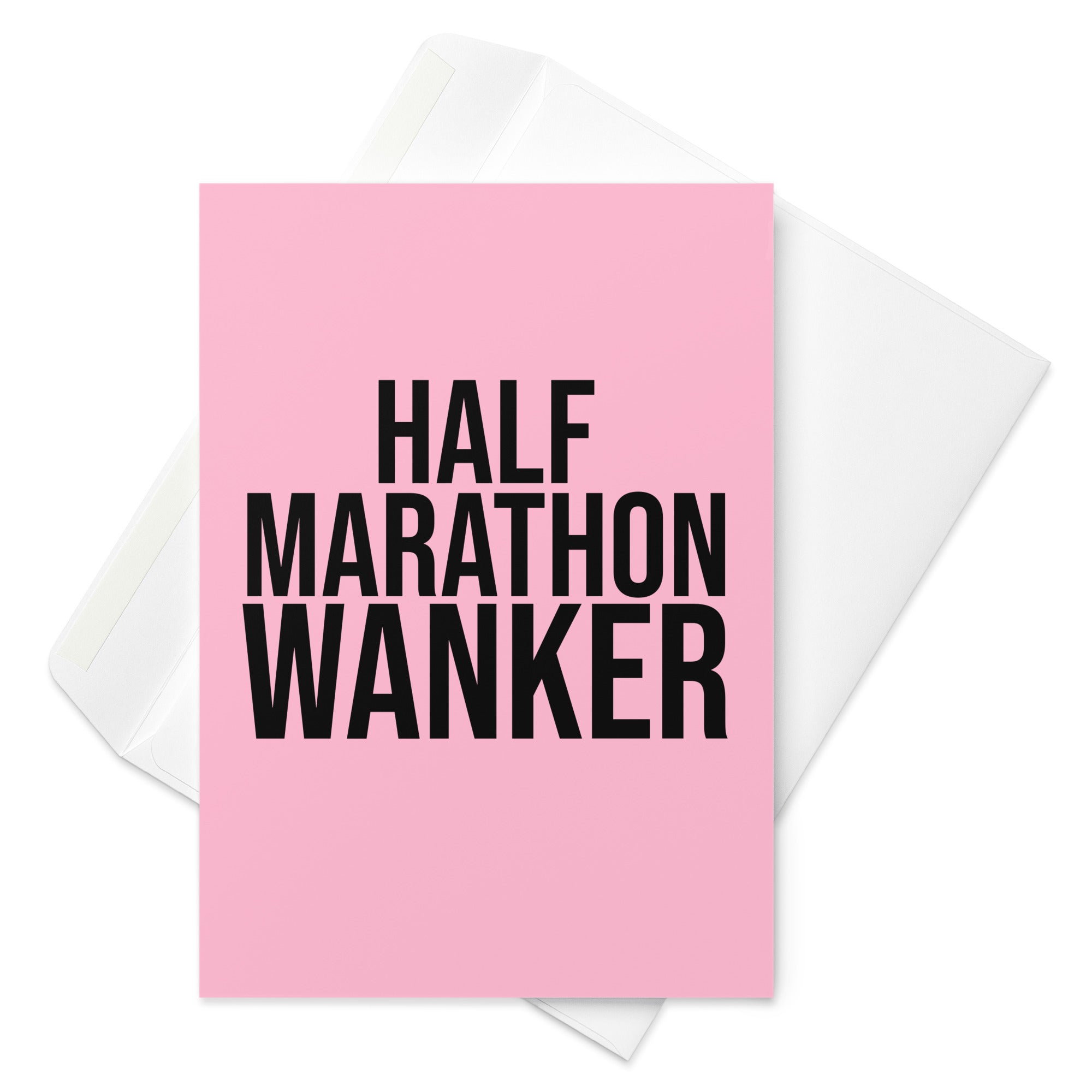 pink greetings card with bold black font reading half marathon wanker. a gift card for someone who has trained for and completed a half marathon