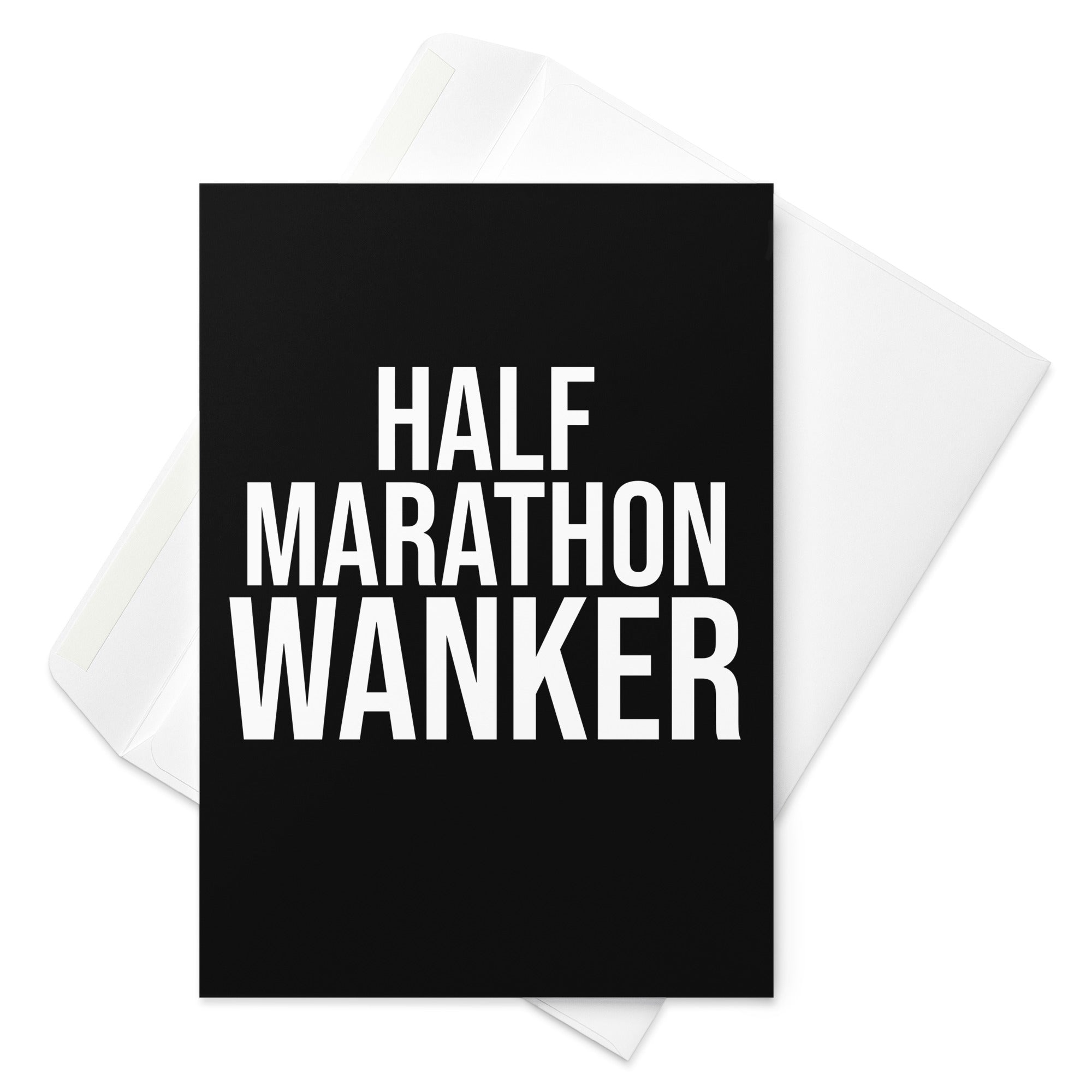 black greetings card with bold white font reading half marathon wanker. a gift card for someone who has trained for and completed a half marathon race