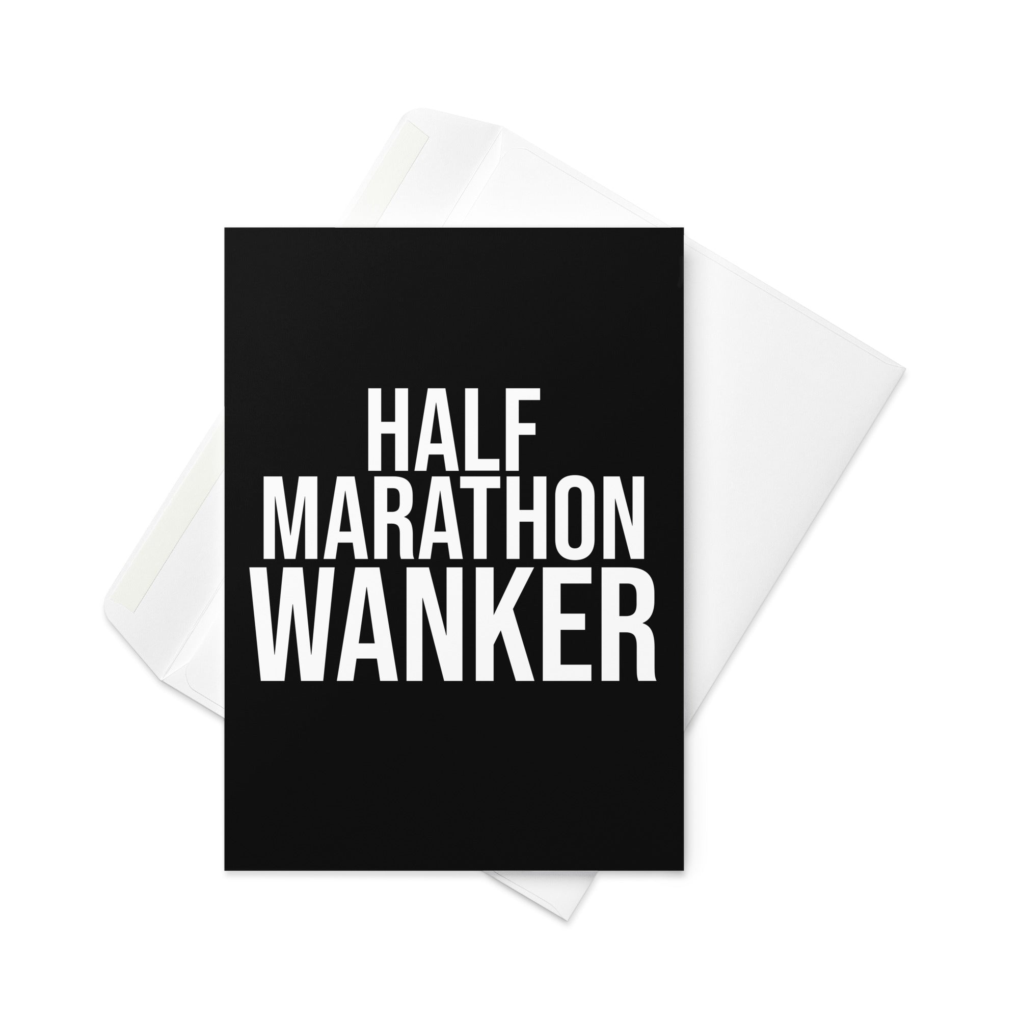 black greetings card with bold white font reading half marathon wanker. a gift card for someone who has trained for and completed a half marathon race