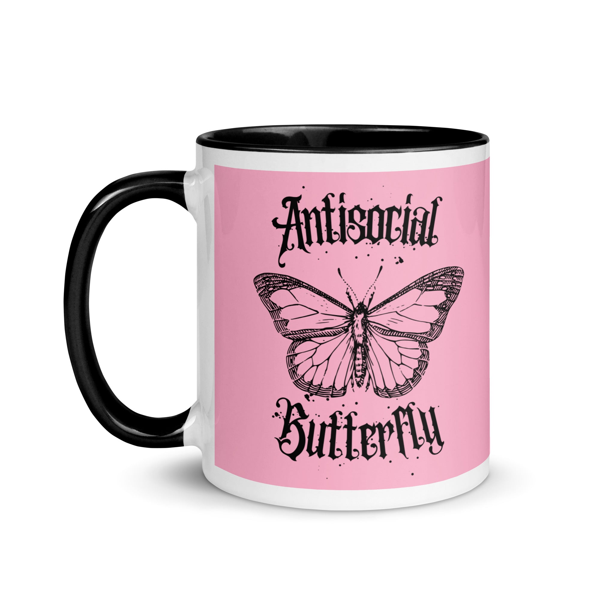 Black and pink ceramic mug with black gothic style text reading “Antisocial Butterfly,” perfect for introverts or gothic coffee lovers.