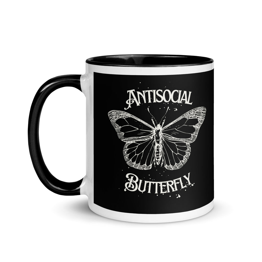 Black ceramic mug with gothic style white text reading “Antisocial Butterfly,” perfect gift for introverts, coffee lovers, or fans of gothic aesthetic drinkware.