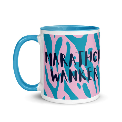 Marathon wanker mug with blue inside and handle, with a pink and blue animal print background and the words marathon wanker in a fun, bold font. 