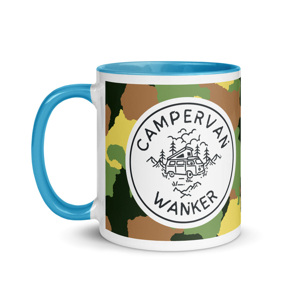 ceramic mug with a blue handle and inside, with a picture of a campervan in the woods and the words campervan wanker over a camouflage background. a gift for people who own and love going away in their campervan or motorhome. 