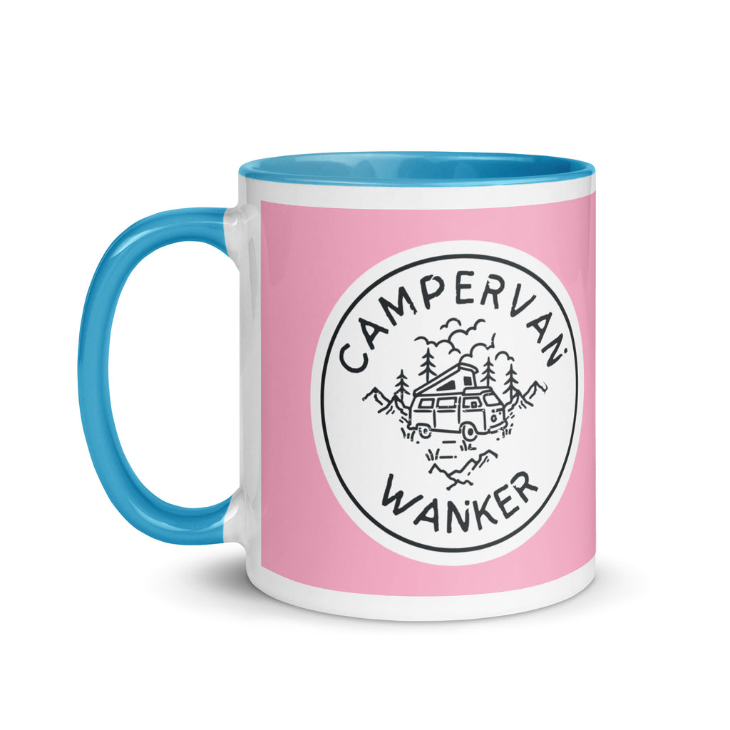 ceramic mug with a blue handle and inside, with a picture of a campervan in the woods and the words campervan wanker over a pink background. a gift for people who own and love going away in their campervan or motorhome. 
