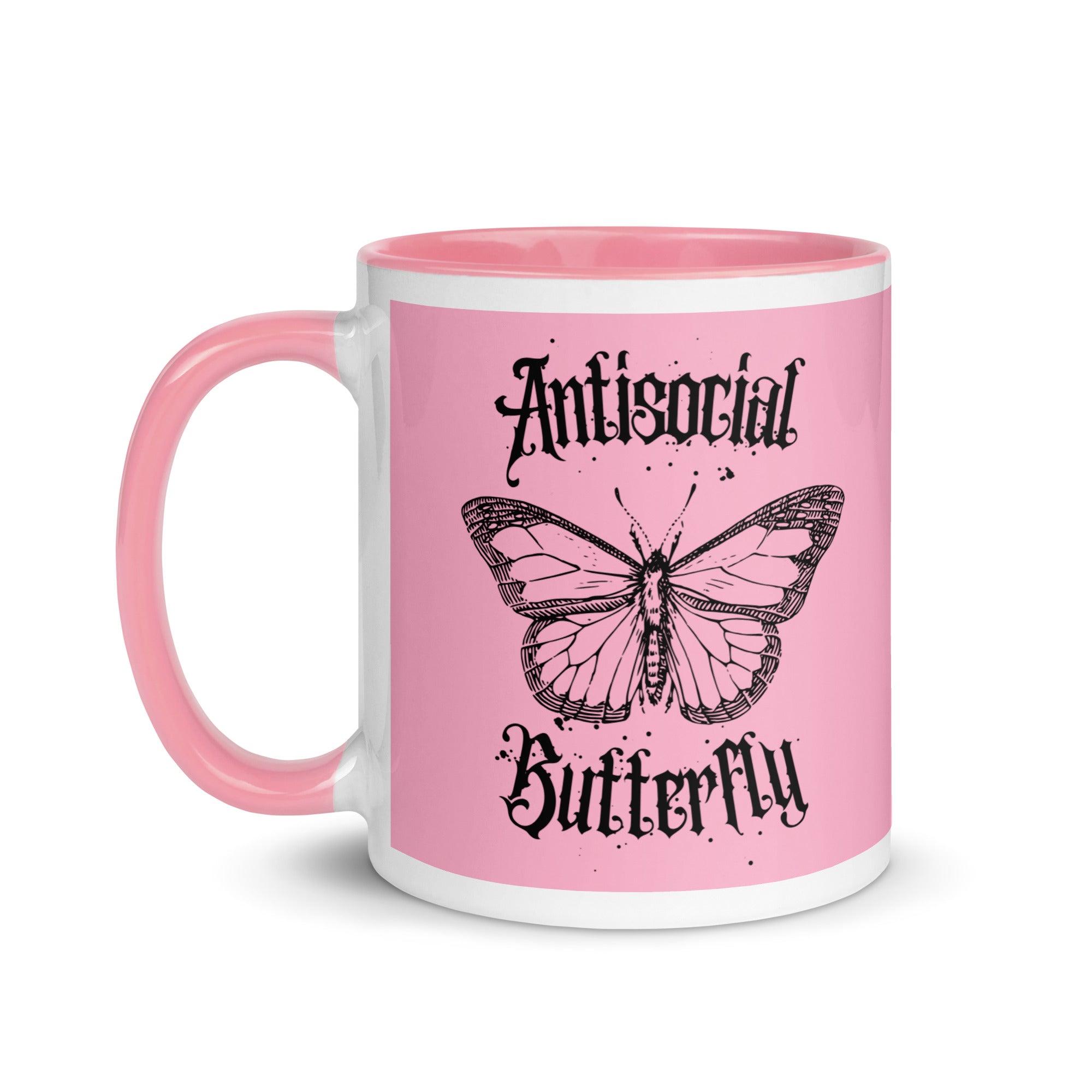 Pink ceramic mug with black gothic style text reading “Antisocial Butterfly,” perfect for introverts or gothic coffee lovers.