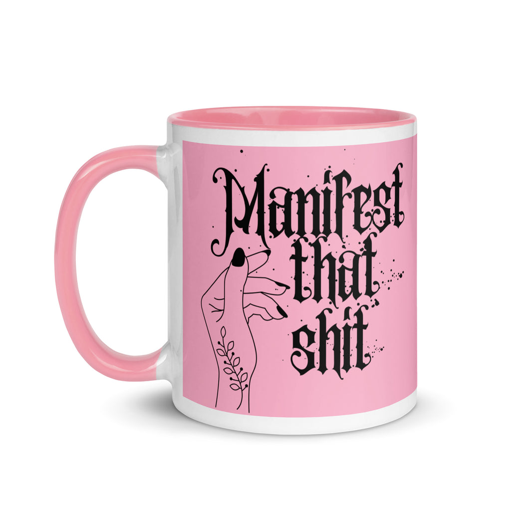 Pink ceramic mug with bold text reading “Manifest That Shit,” motivational coffee cup for goal setters, law of attraction lovers, and positive vibe drinkware.