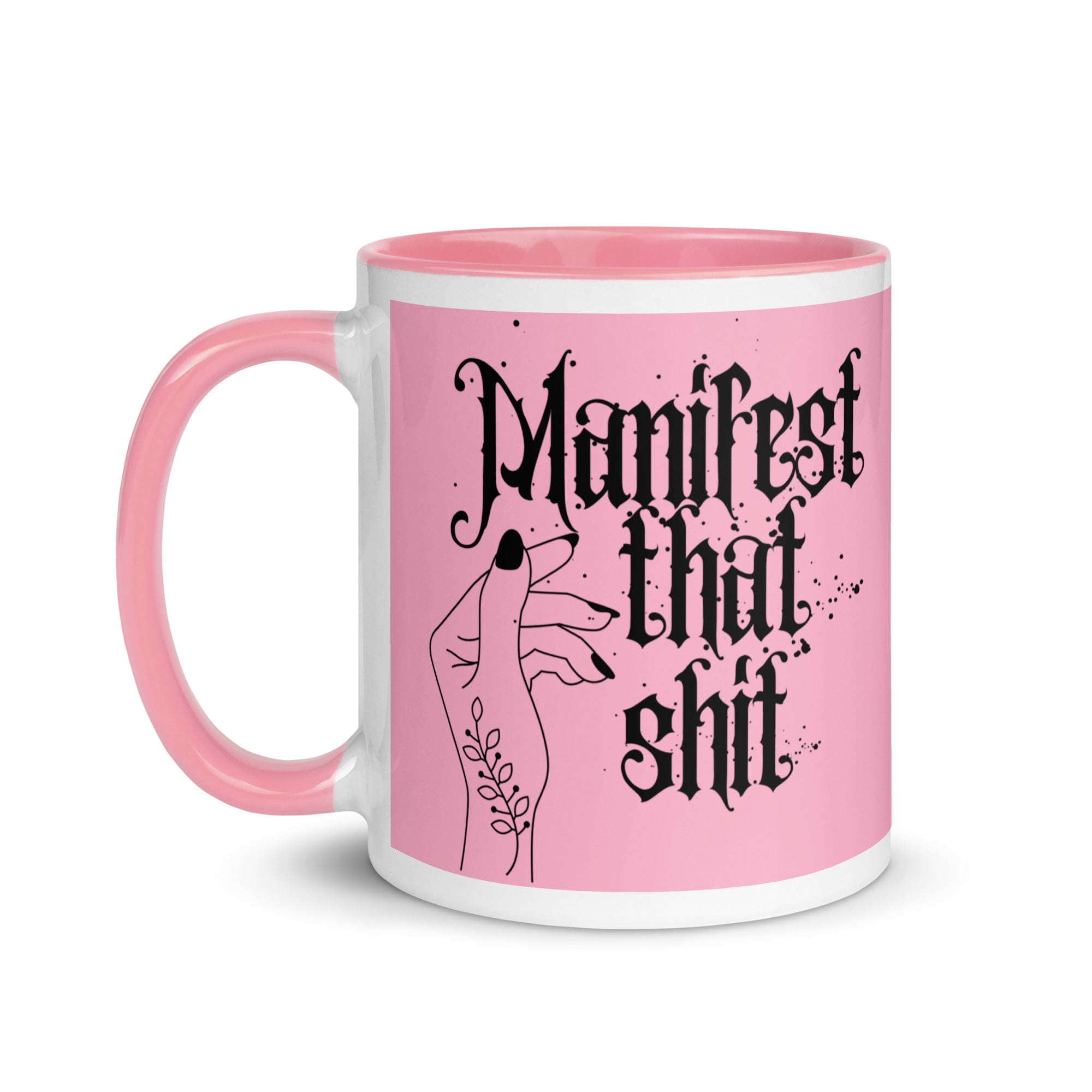 Pink ceramic mug with bold text reading “Manifest That Shit,” motivational coffee cup for goal setters, law of attraction lovers, and positive vibe drinkware.