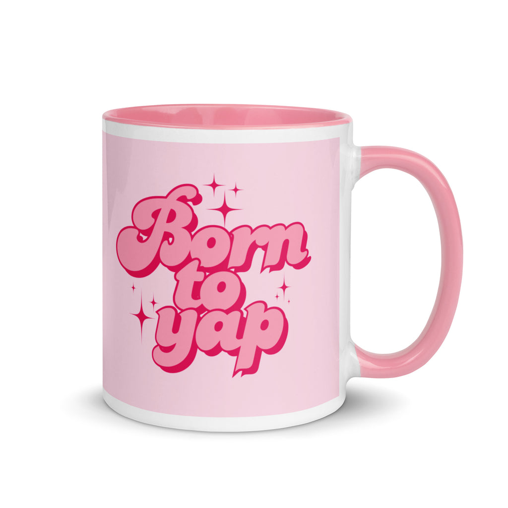 Pink ceramic mug with text “Born to Yap,” fun coffee cup for chatty friends and gossip lovers.