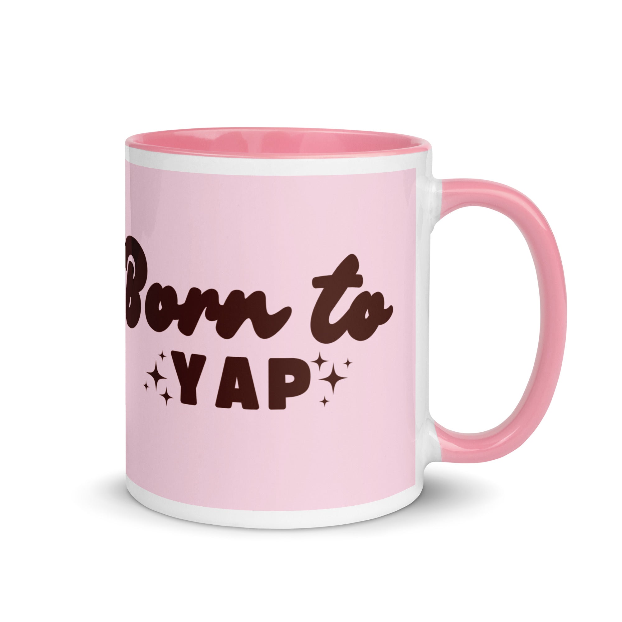 Pink ceramic mug with text “Born to Yap,” fun coffee cup for chatty friends and gossip lovers.