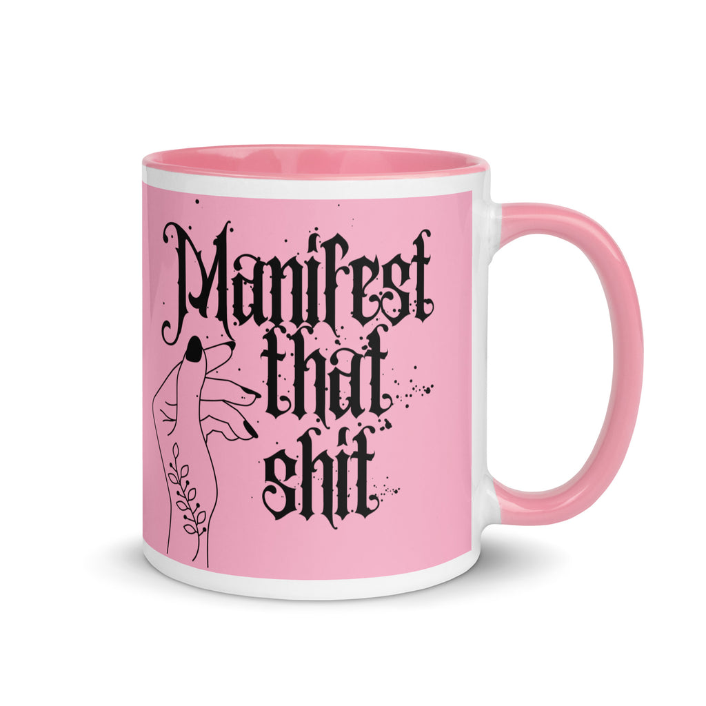 Pink ceramic mug with bold text reading “Manifest That Shit,” motivational coffee cup for goal setters, law of attraction lovers, and positive vibe drinkware.
