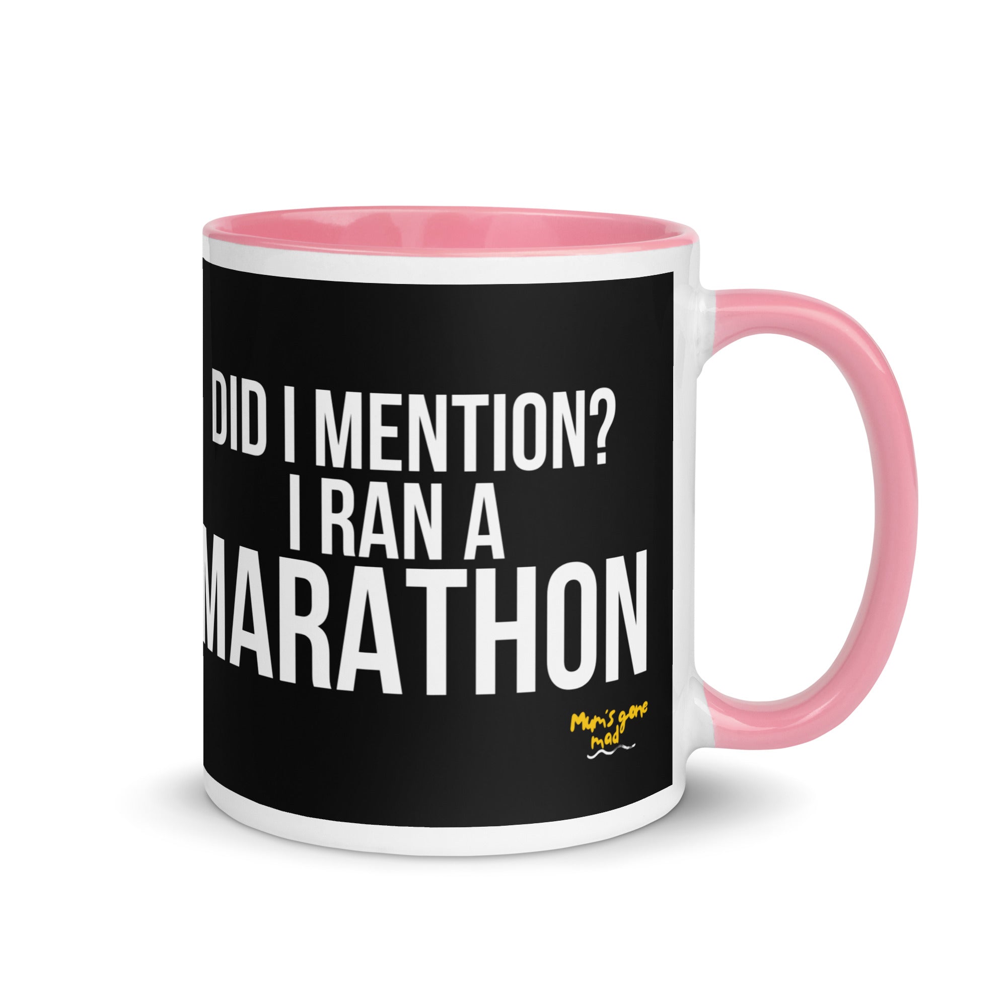 mug with pink handle and the words did I mention? I ran a marathon in a white font. A gift for a marathon runner. 