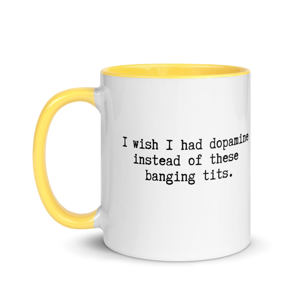 a white ceramic mug with a yellow handle and inside reading I wish I had dopamine instead of these banging tits. A gift mug or people with adhd