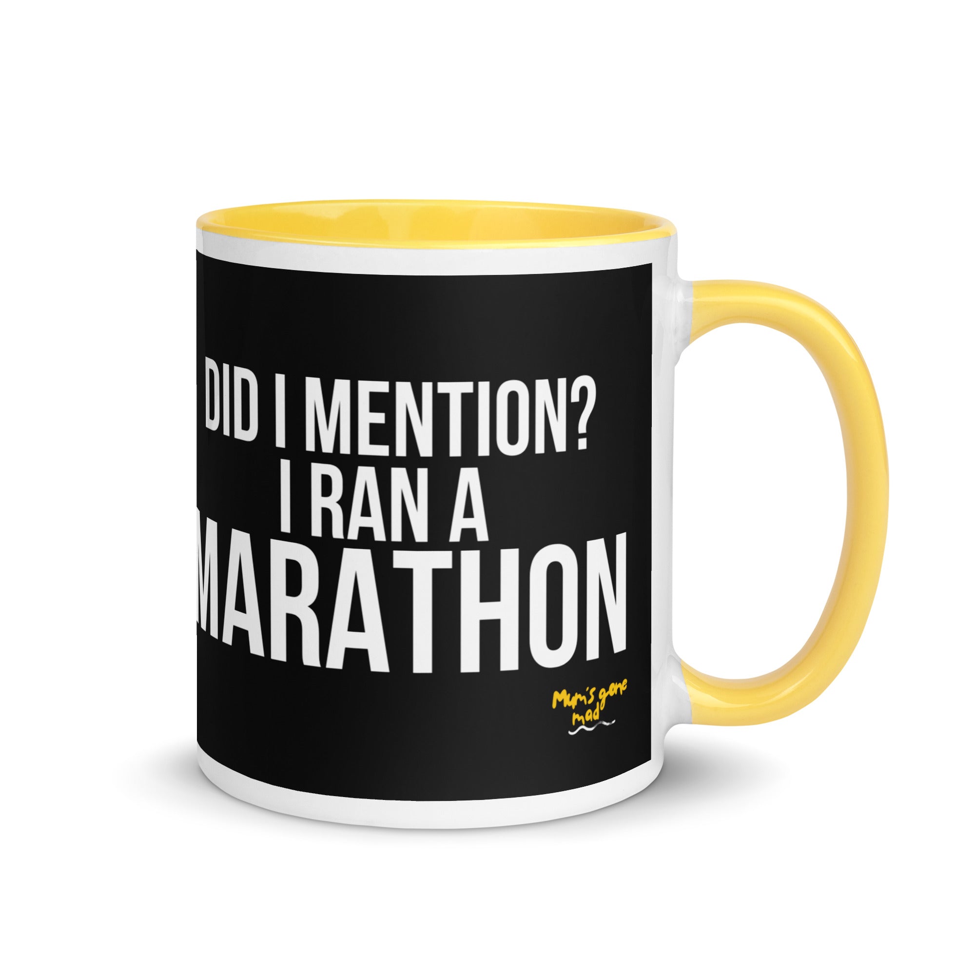 mug with yellow handle and the words did I mention? I ran a marathon in a white font. A gift for a marathon runner. 